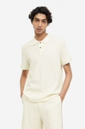 Poloshirt mit Waffelmuster in Slim Fit 18.99 €